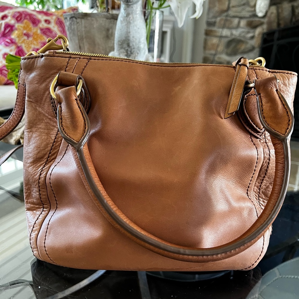 Very nice leather J. Crew bag. Handles as well as strap.